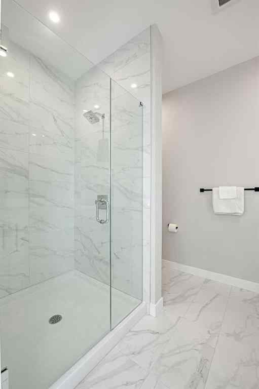 MLS® A2251334 - 8149 8 Avenue SW in West Springs Calgary, Residential