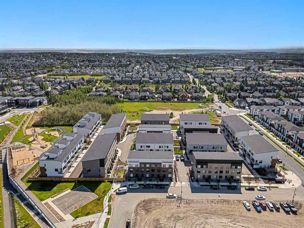 MLS® A2251334 - 8149 8 Avenue SW in West Springs Calgary, Residential