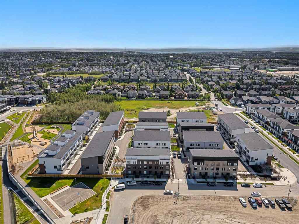 MLS® A2251334 - 8149 8 Avenue SW in West Springs Calgary, Residential