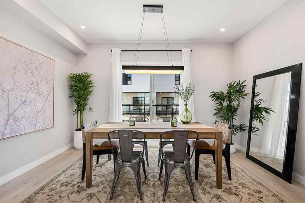 MLS® A2251334 - 8149 8 Avenue SW in West Springs Calgary, Residential