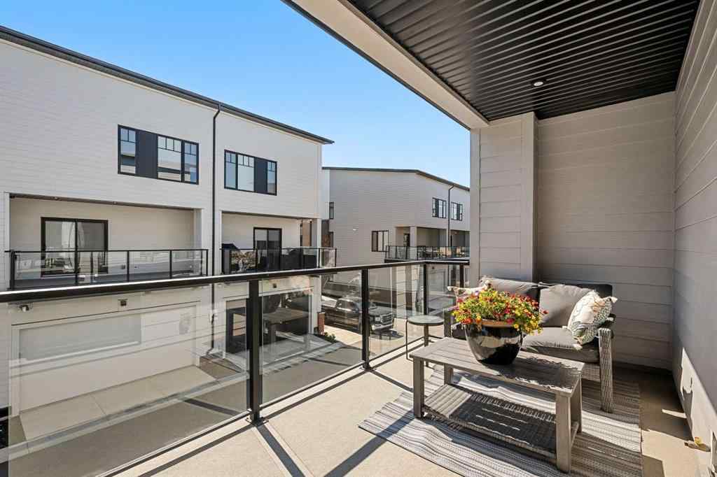 MLS® A2251334 - 8149 8 Avenue SW in West Springs Calgary, Residential