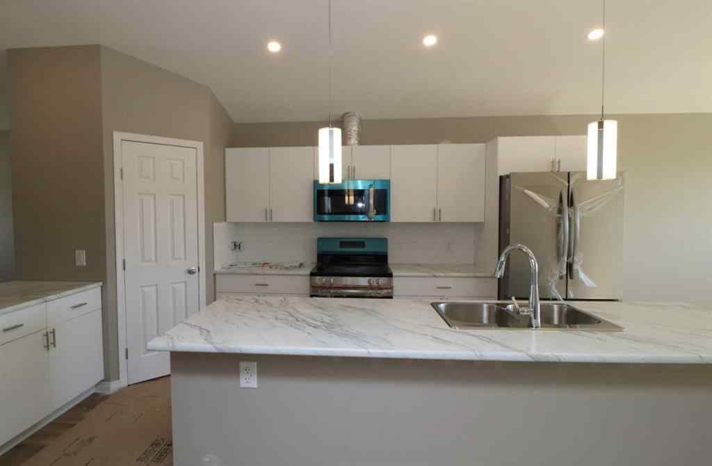 MLS® A2251345 - 443 Henricks Drive  in NONE Irricana, Residential