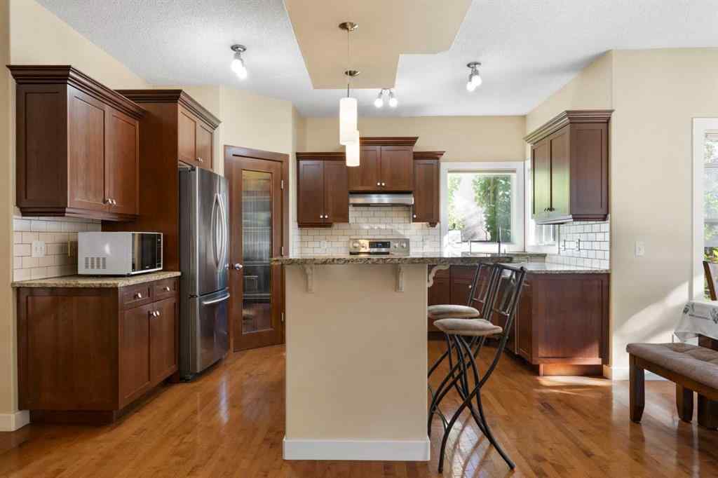 MLS® A2251358 - 46 Tuscany Glen Way NW in Tuscany Calgary, Residential