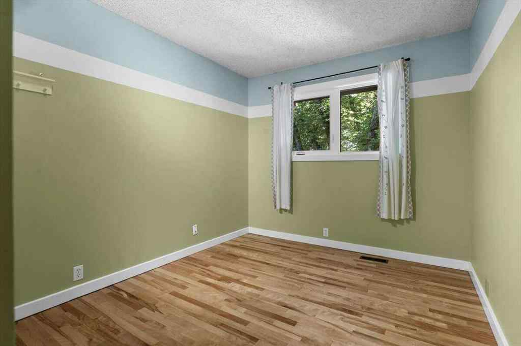 MLS® A2251385 - 907 36B Street NW in Parkdale Calgary, Residential