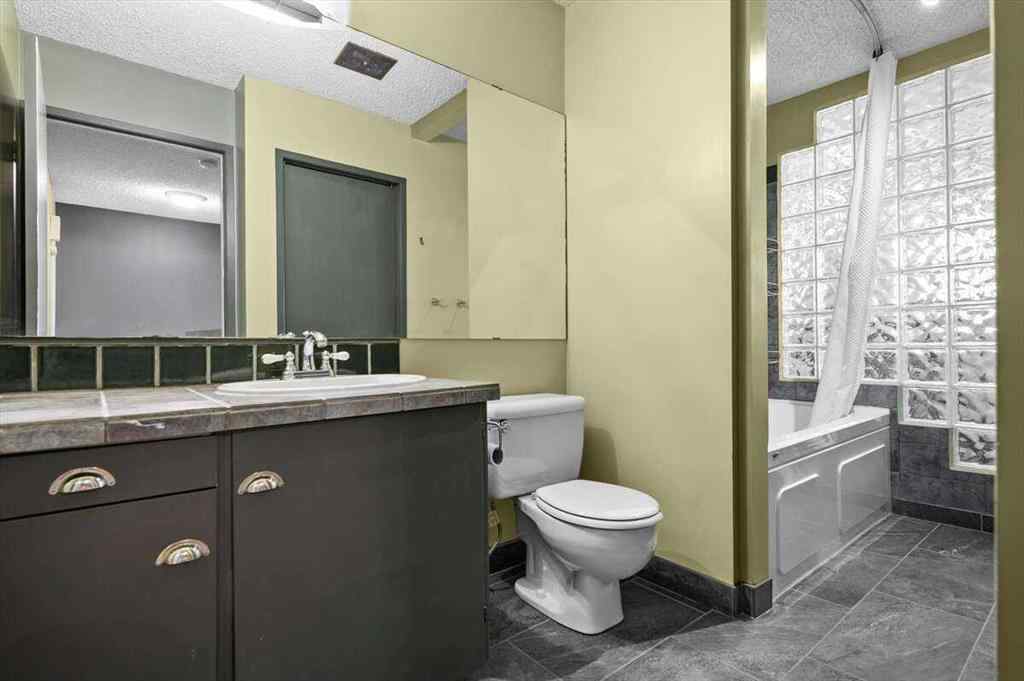 MLS® A2251385 - 907 36B Street NW in Parkdale Calgary, Residential