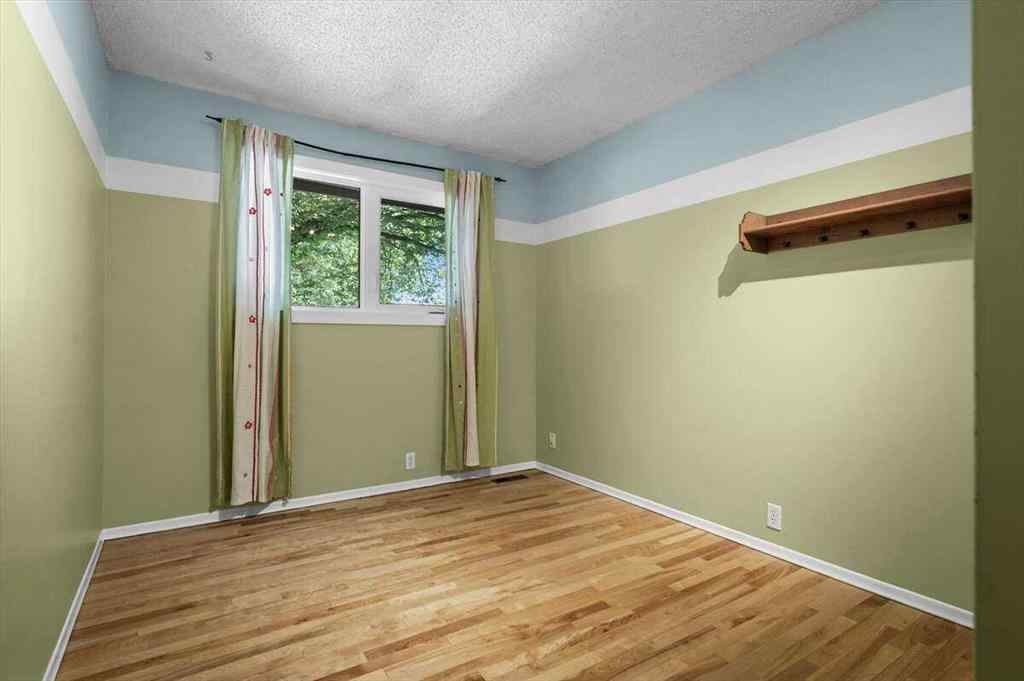 MLS® A2251385 - 907 36B Street NW in Parkdale Calgary, Residential