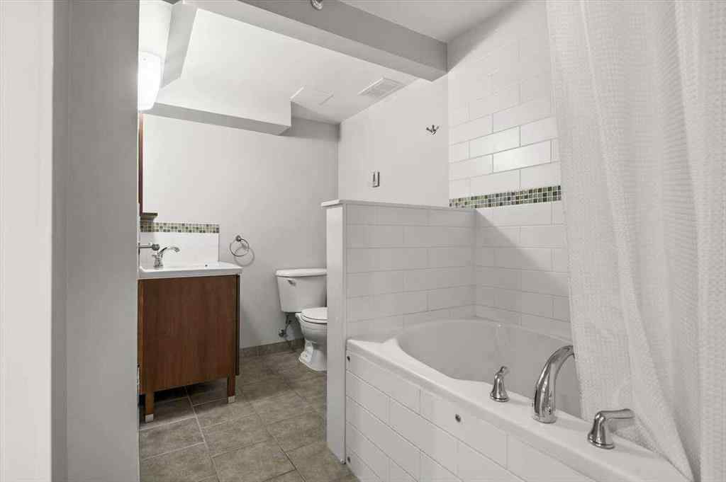 MLS® A2251385 - 907 36B Street NW in Parkdale Calgary, Residential