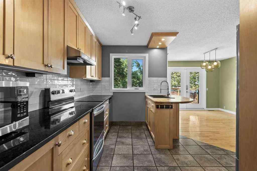 MLS® A2251385 - 907 36B Street NW in Parkdale Calgary, Residential