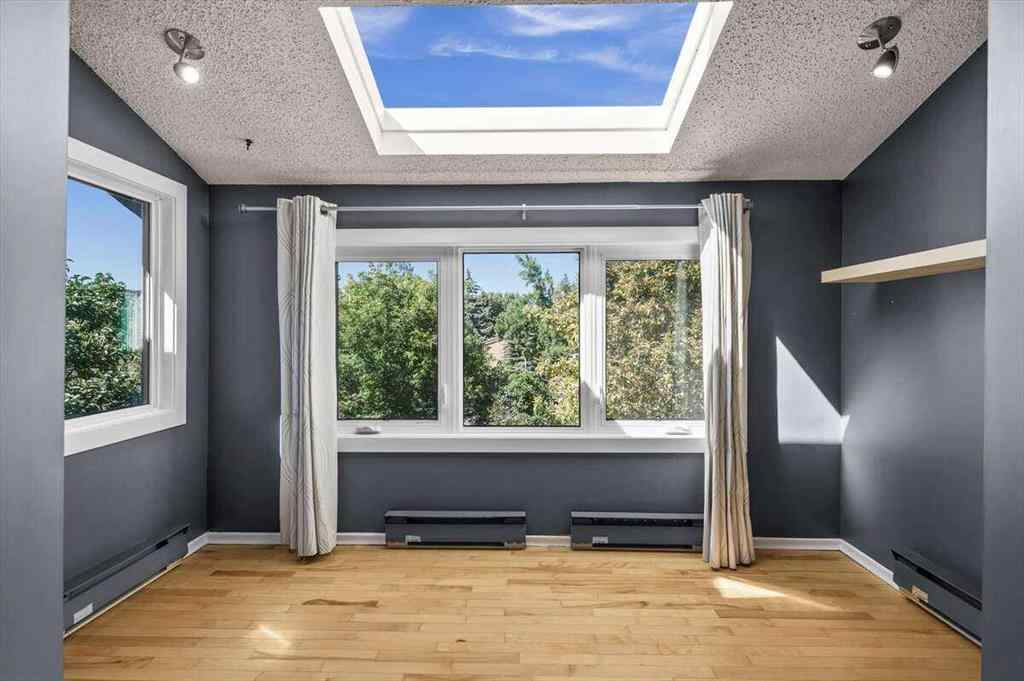MLS® A2251385 - 907 36B Street NW in Parkdale Calgary, Residential