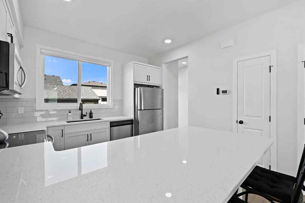 MLS® A2251386 - 656 Savanna Boulevard NE in Saddle Ridge Calgary, Residential