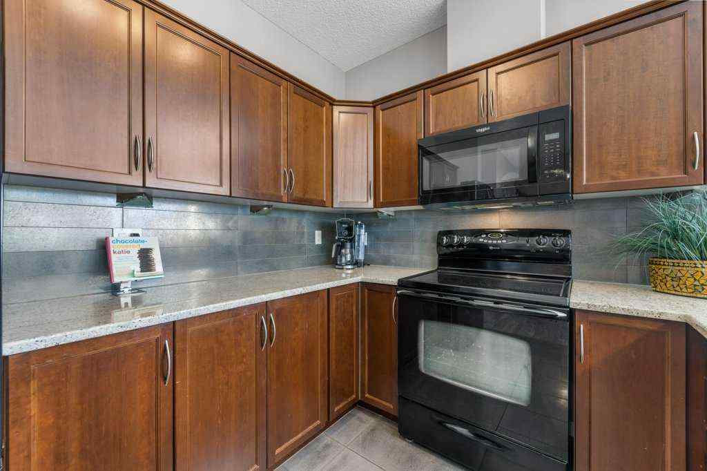 MLS® A2251387 - Unit #129 1 Crystal Green Lane  in Crystal Green Okotoks, Residential