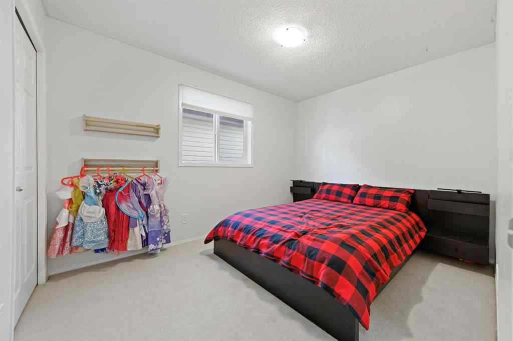 MLS® A2251392 - 128 Everglen Road SW in Evergreen Calgary, Residential