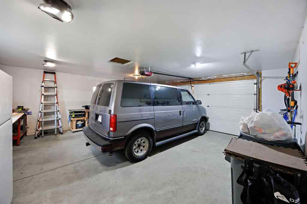 MLS® A2251392 - 128 Everglen Road SW in Evergreen Calgary, Residential