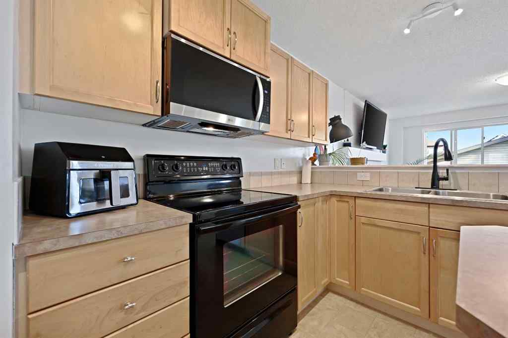 MLS® A2251392 - 128 Everglen Road SW in Evergreen Calgary, Residential