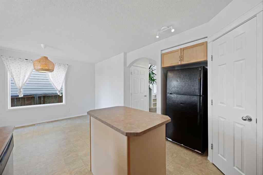 MLS® A2251392 - 128 Everglen Road SW in Evergreen Calgary, Residential