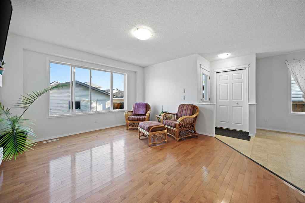 MLS® A2251392 - 128 Everglen Road SW in Evergreen Calgary, Residential