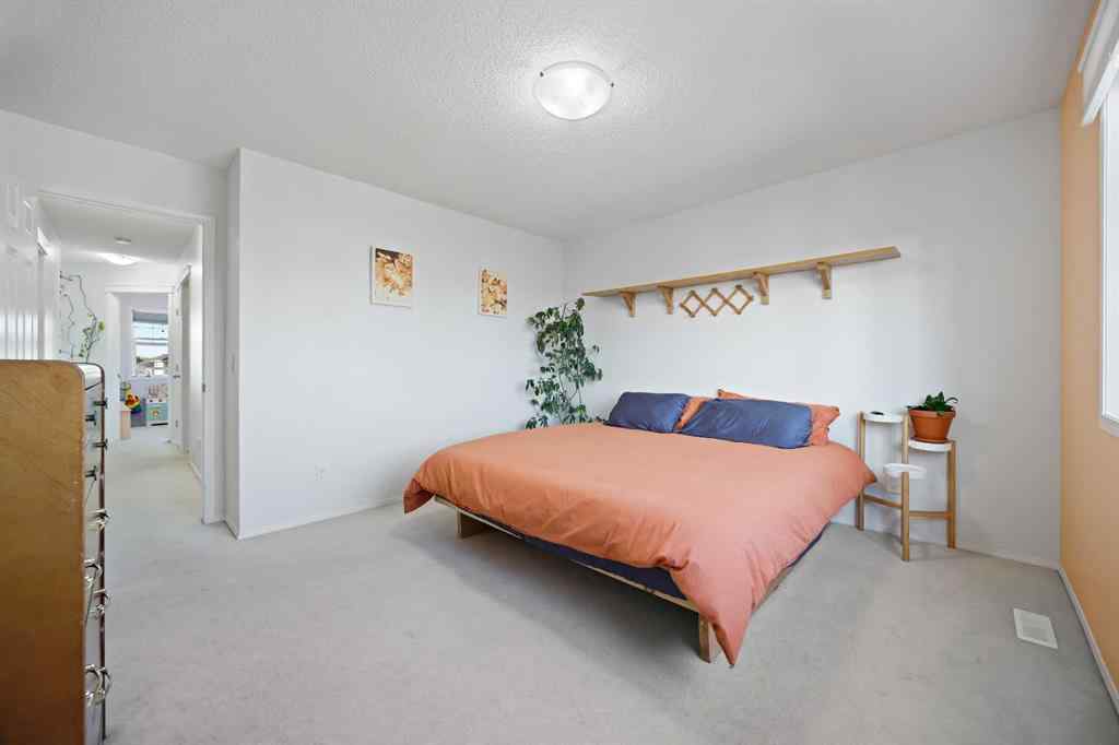 MLS® A2251392 - 128 Everglen Road SW in Evergreen Calgary, Residential