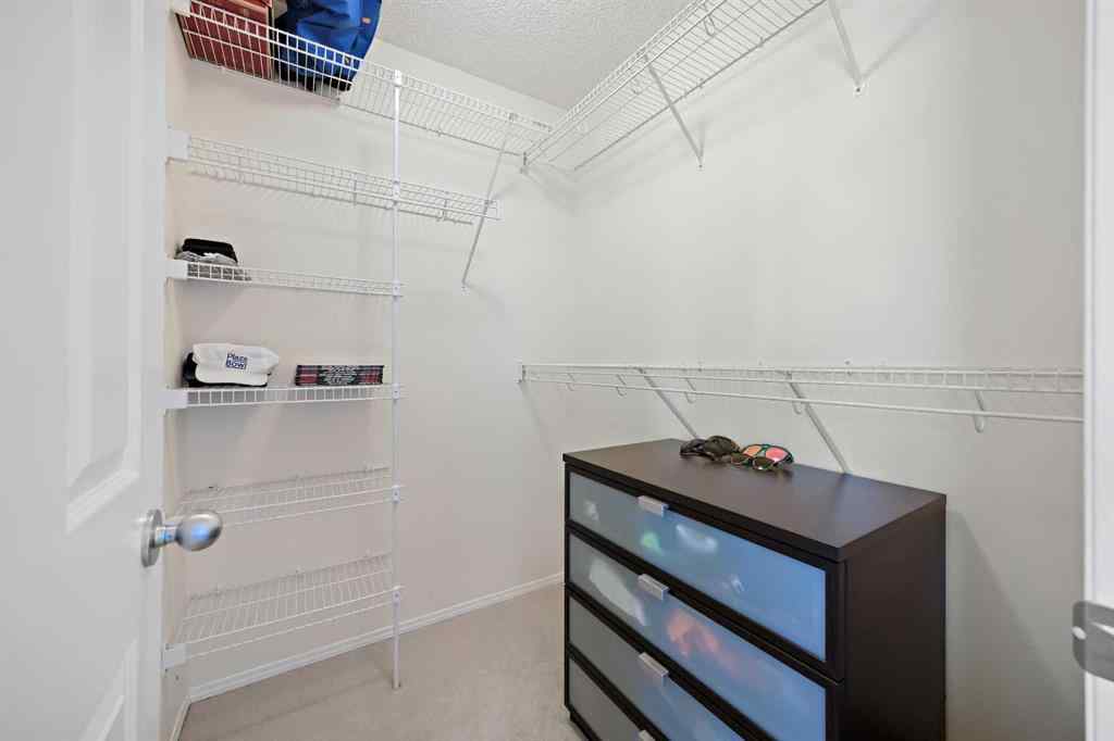 MLS® A2251392 - 128 Everglen Road SW in Evergreen Calgary, Residential