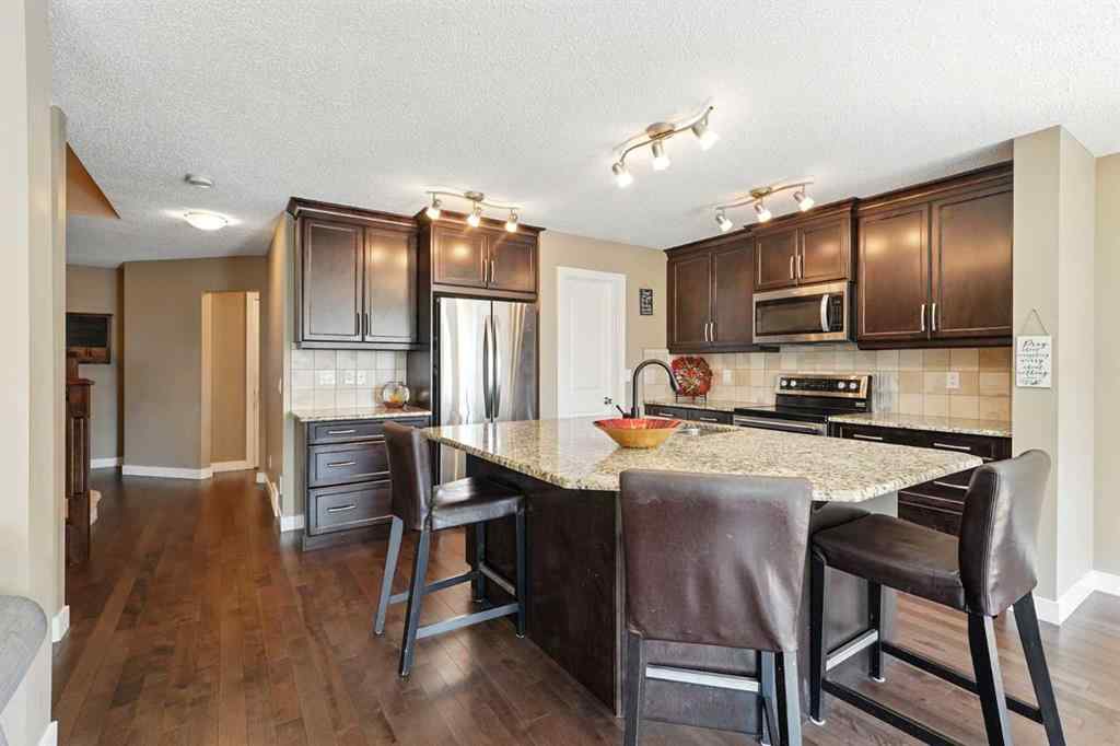 MLS® A2251393 - 124 Kingsbridge Way SE in Kings Heights Airdrie, Residential