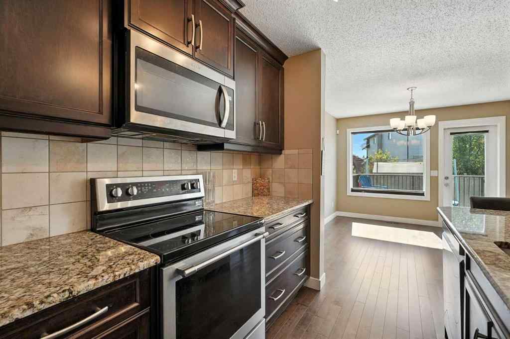 MLS® A2251393 - 124 Kingsbridge Way SE in Kings Heights Airdrie, Residential