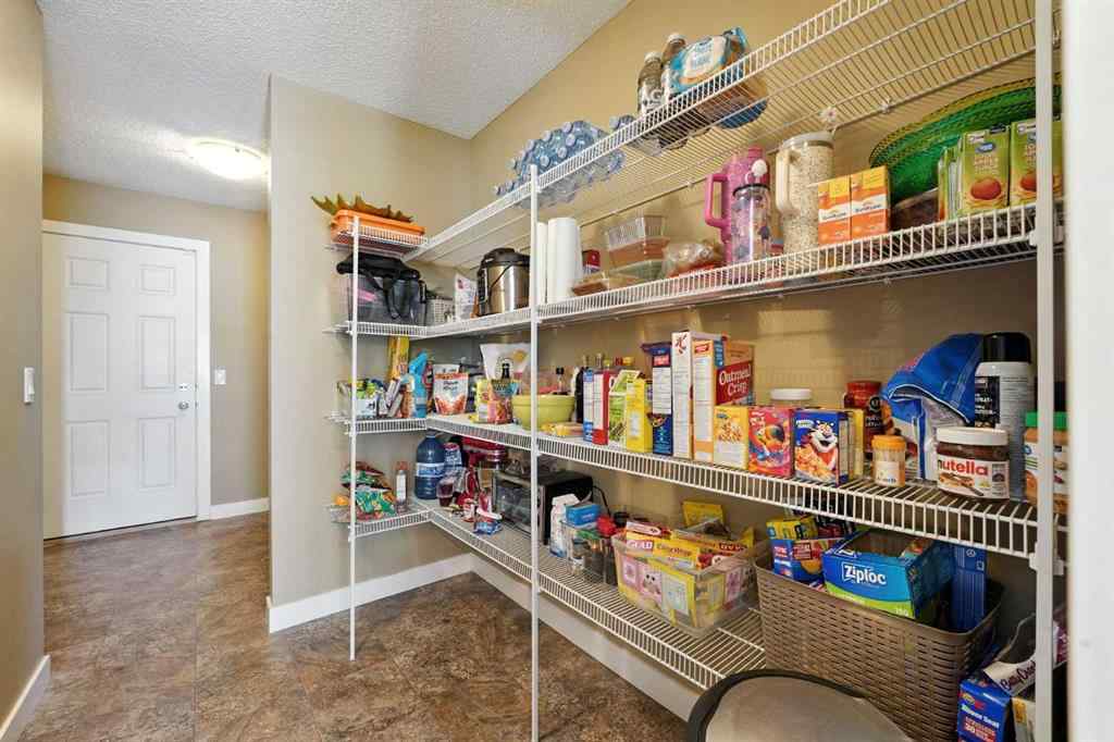 MLS® A2251393 - 124 Kingsbridge Way SE in Kings Heights Airdrie, Residential