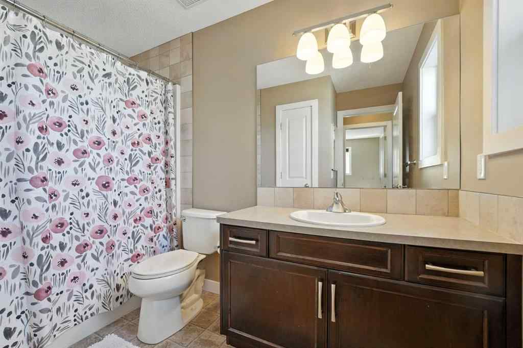 MLS® A2251393 - 124 Kingsbridge Way SE in Kings Heights Airdrie, Residential