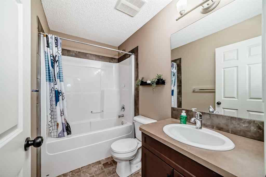 MLS® A2251395 - 28 Sunset Road  in Sunset Ridge Cochrane, Residential