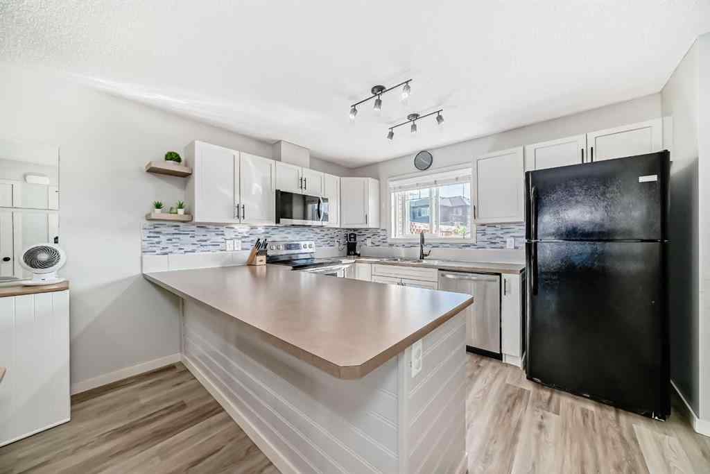 MLS® A2251395 - 28 Sunset Road  in Sunset Ridge Cochrane, Residential