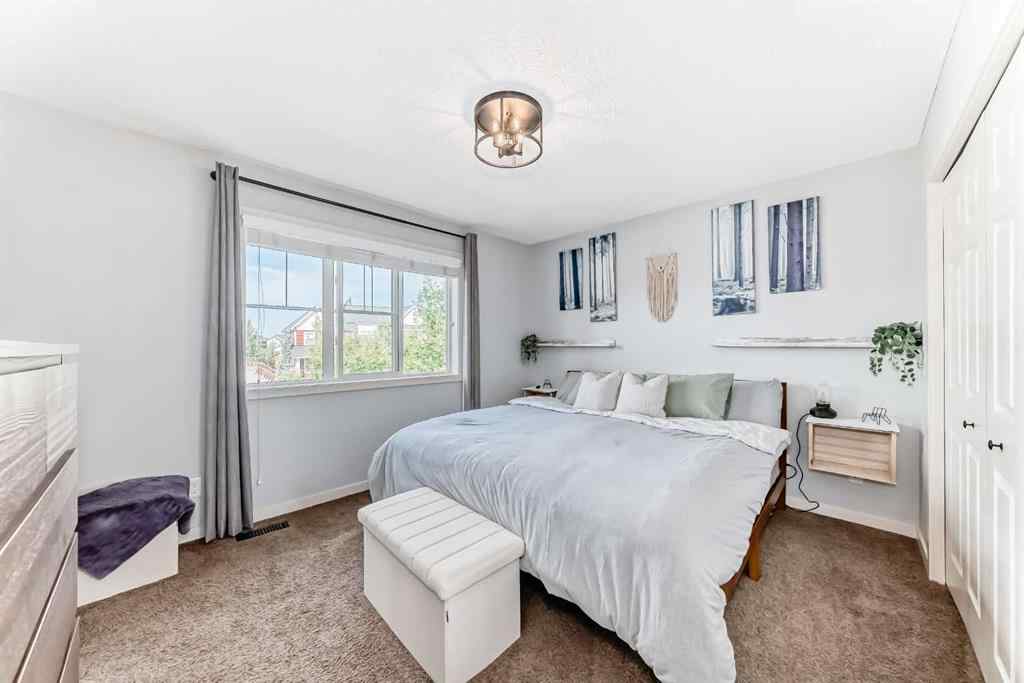MLS® A2251395 - 28 Sunset Road  in Sunset Ridge Cochrane, Residential