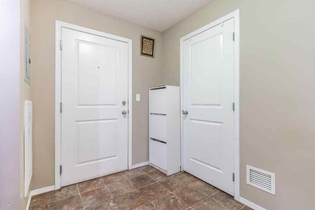MLS® A2251401 - Unit #203 5 Saddlestone Way NE in Saddle Ridge Calgary, Residential