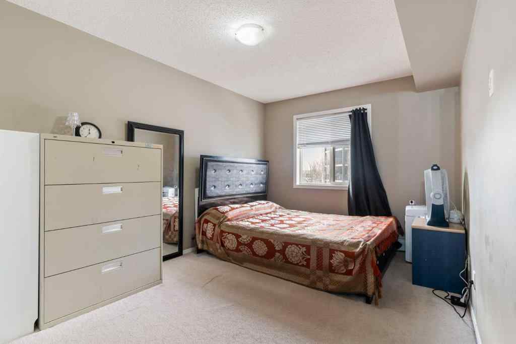 MLS® A2251401 - Unit #203 5 Saddlestone Way NE in Saddle Ridge Calgary, Residential