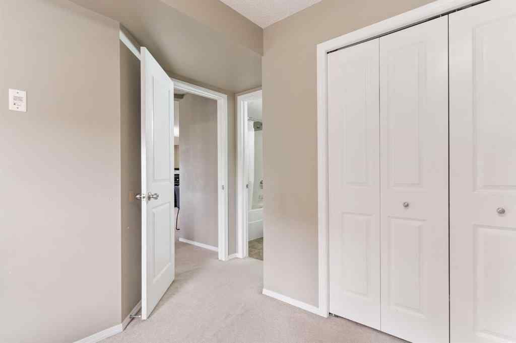 MLS® A2251401 - Unit #203 5 Saddlestone Way NE in Saddle Ridge Calgary, Residential
