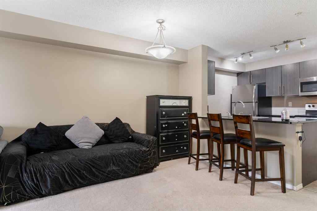 MLS® A2251401 - Unit #203 5 Saddlestone Way NE in Saddle Ridge Calgary, Residential
