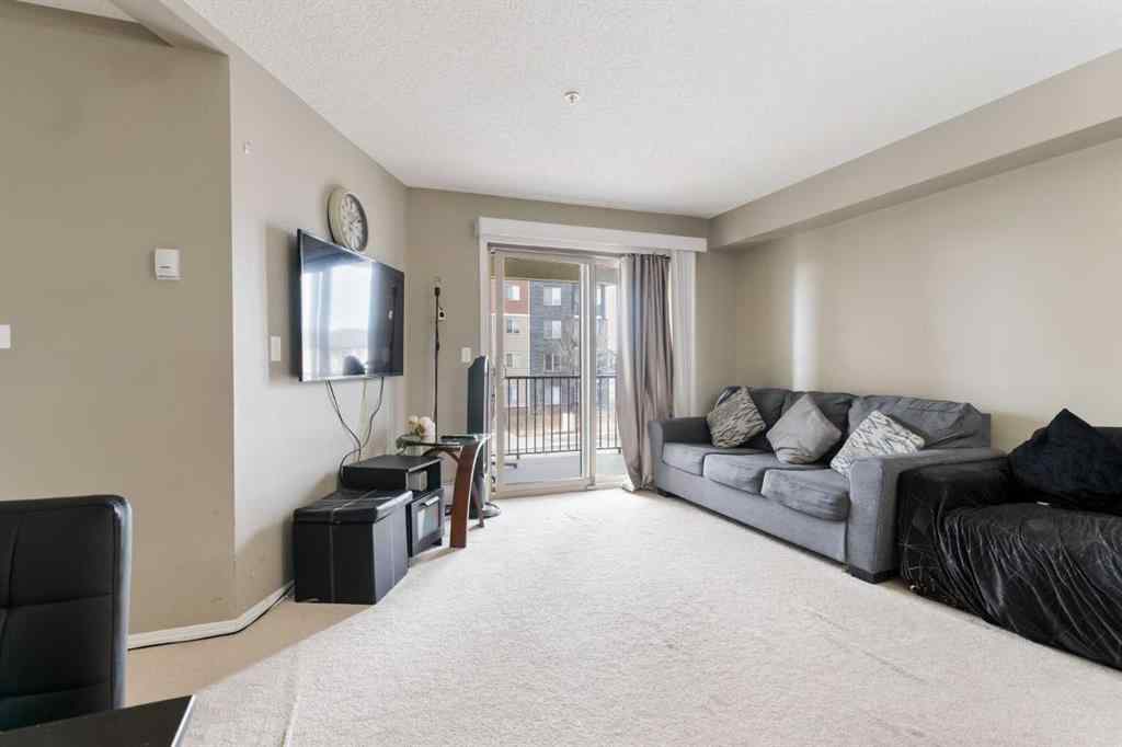 MLS® A2251401 - Unit #203 5 Saddlestone Way NE in Saddle Ridge Calgary, Residential