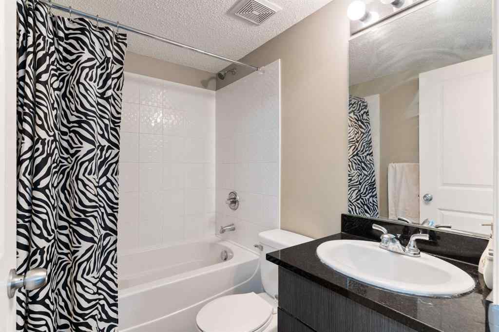 MLS® A2251401 - Unit #203 5 Saddlestone Way NE in Saddle Ridge Calgary, Residential