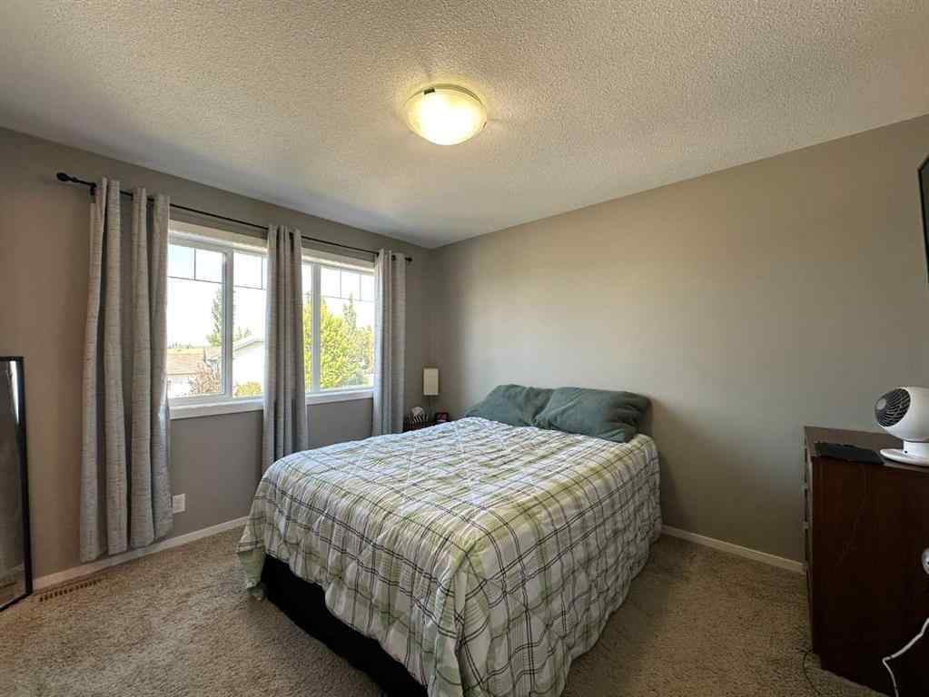 MLS® A2251402 - 5815 63 Avenue Close  in Lucas Heights Ponoka, Residential