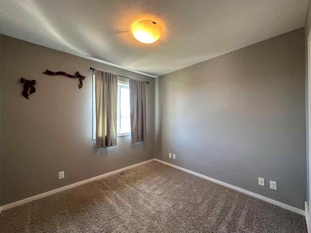 MLS® A2251402 - 5815 63 Avenue Close  in Lucas Heights Ponoka, Residential