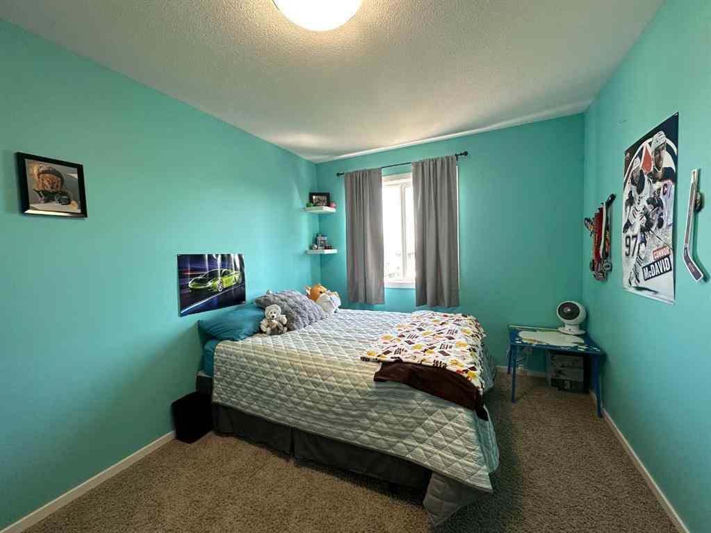 MLS® A2251402 - 5815 63 Avenue Close  in Lucas Heights Ponoka, Residential