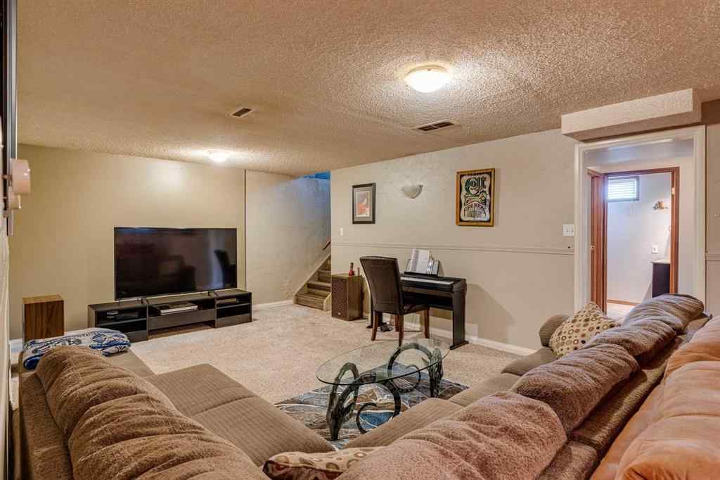 MLS® A2251410 - 1311 68 Street NE in Marlborough Park Calgary, Residential