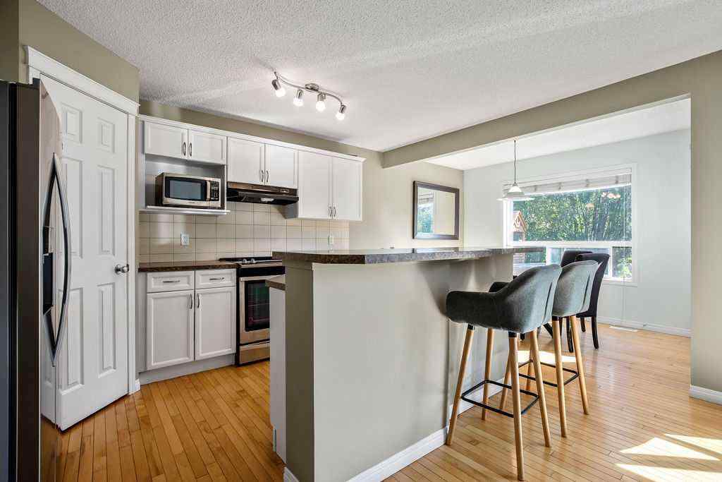 MLS® A2251412 - 275 Cougar Plateau Way SW in Cougar Ridge Calgary, Residential