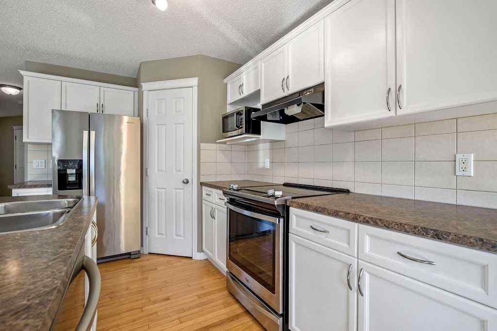 MLS® A2251412 - 275 Cougar Plateau Way SW in Cougar Ridge Calgary, Residential