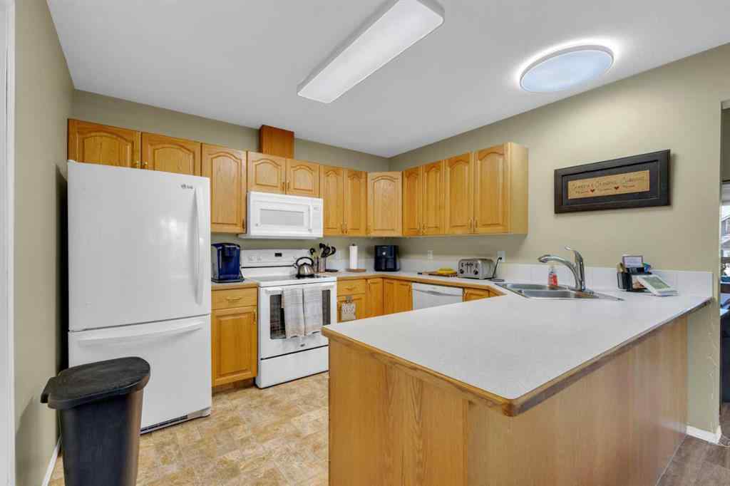 MLS® A2251449 - Unit #B 3621 51 Avenue  in South Hill Red Deer, Residential