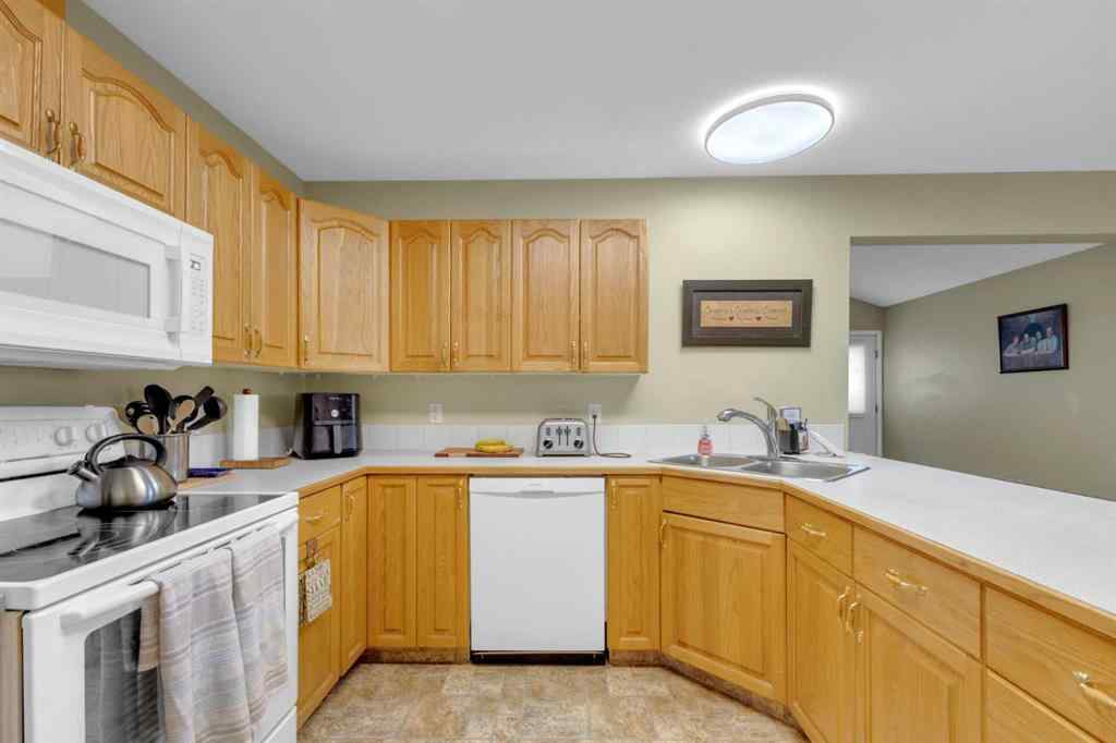 MLS® A2251449 - Unit #B 3621 51 Avenue  in South Hill Red Deer, Residential