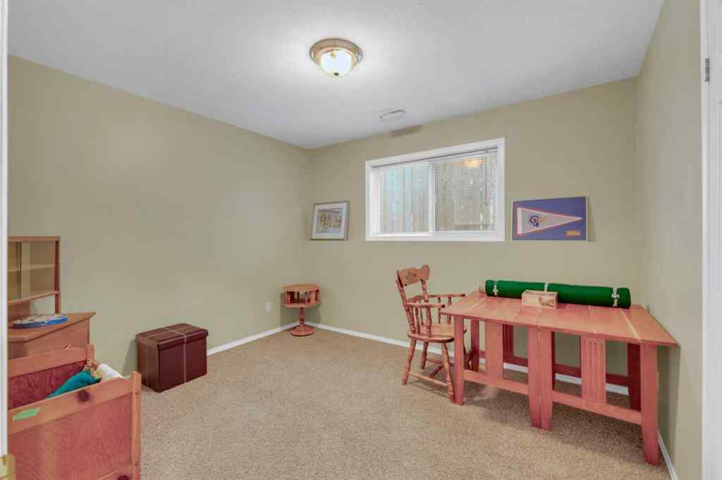 MLS® A2251449 - Unit #B 3621 51 Avenue  in South Hill Red Deer, Residential