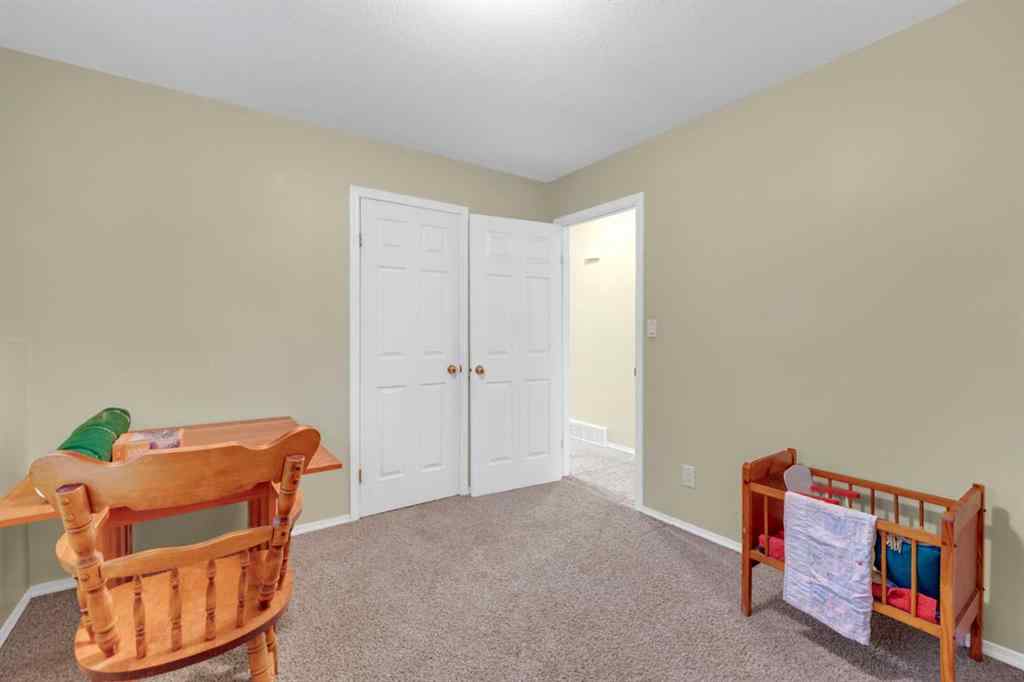 MLS® A2251449 - Unit #B 3621 51 Avenue  in South Hill Red Deer, Residential