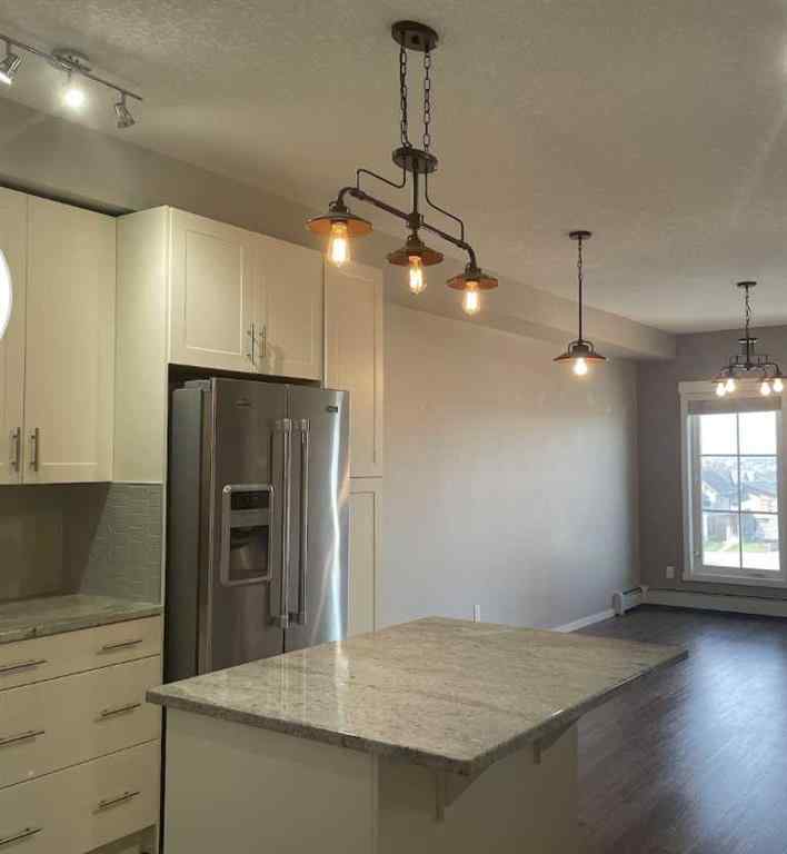 MLS® A2251453 - Unit #4408 755 Copperpond Boulevard SE in Copperfield Calgary, Residential