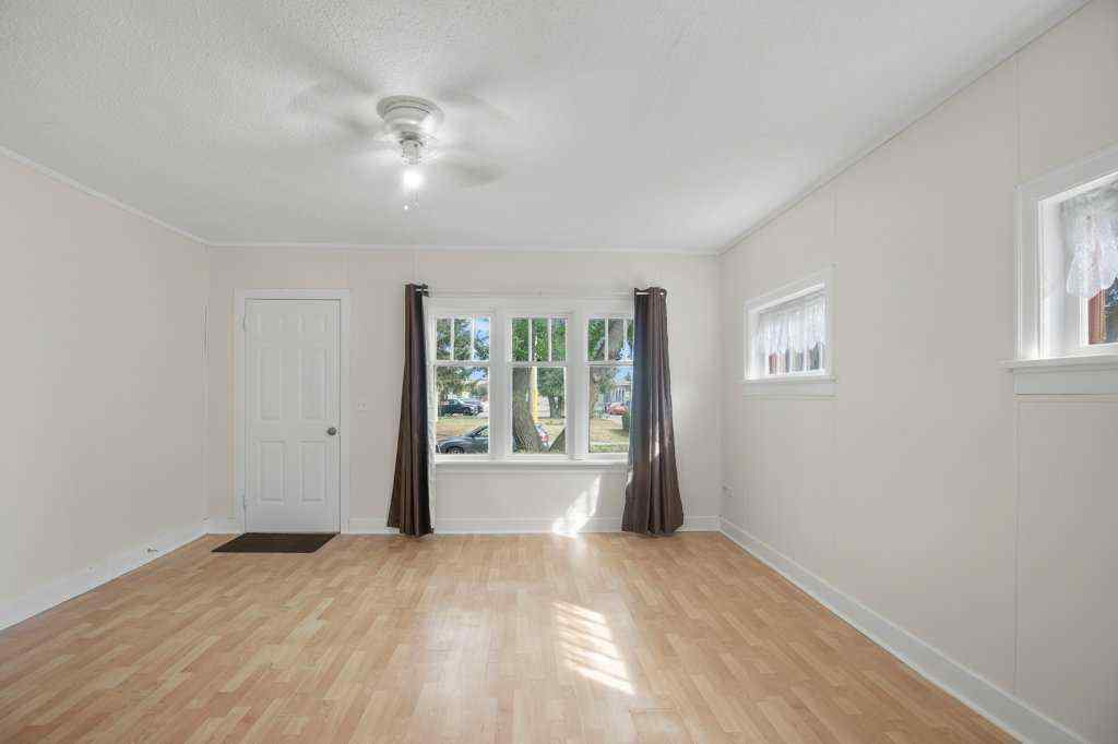 MLS® A2251476 - 5812 52 Avenue  in Riverside Meadows Red Deer, Residential