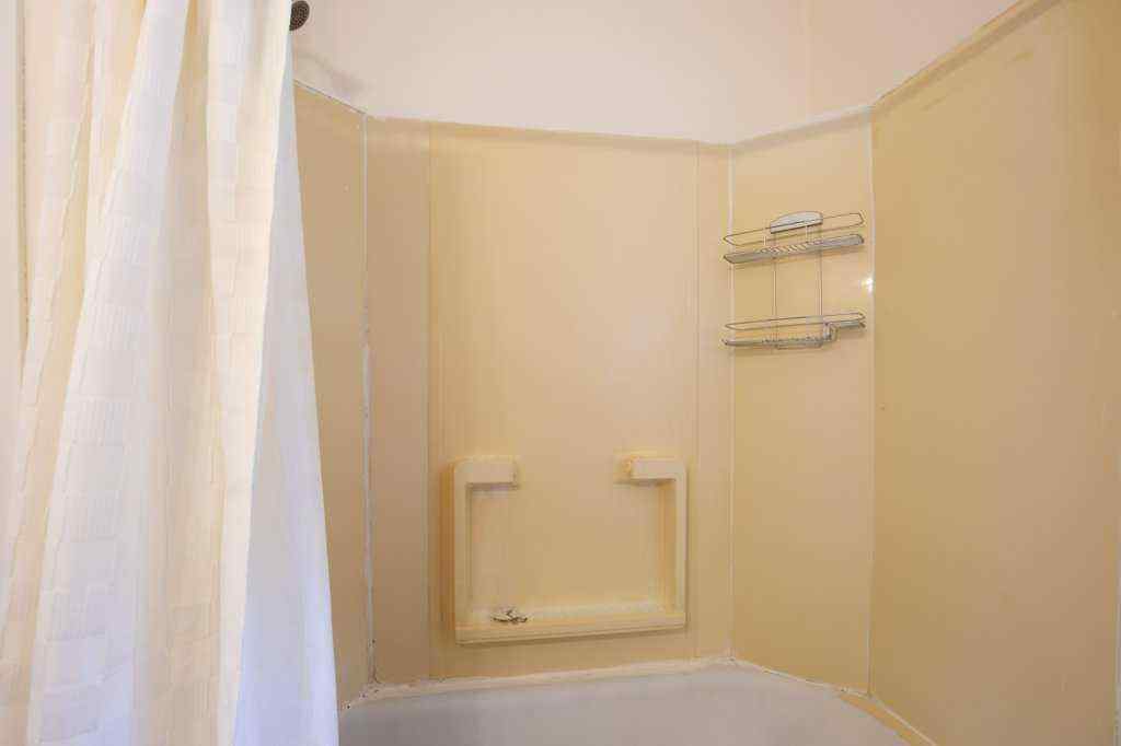 MLS® A2251476 - 5812 52 Avenue  in Riverside Meadows Red Deer, Residential