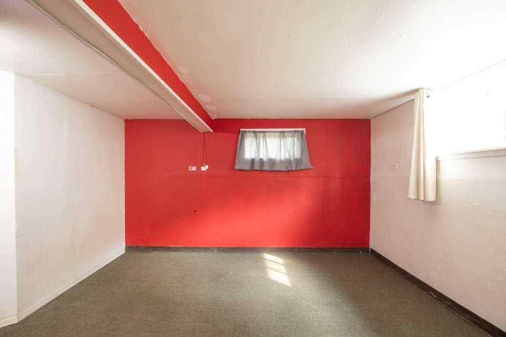 MLS® A2251476 - 5812 52 Avenue  in Riverside Meadows Red Deer, Residential