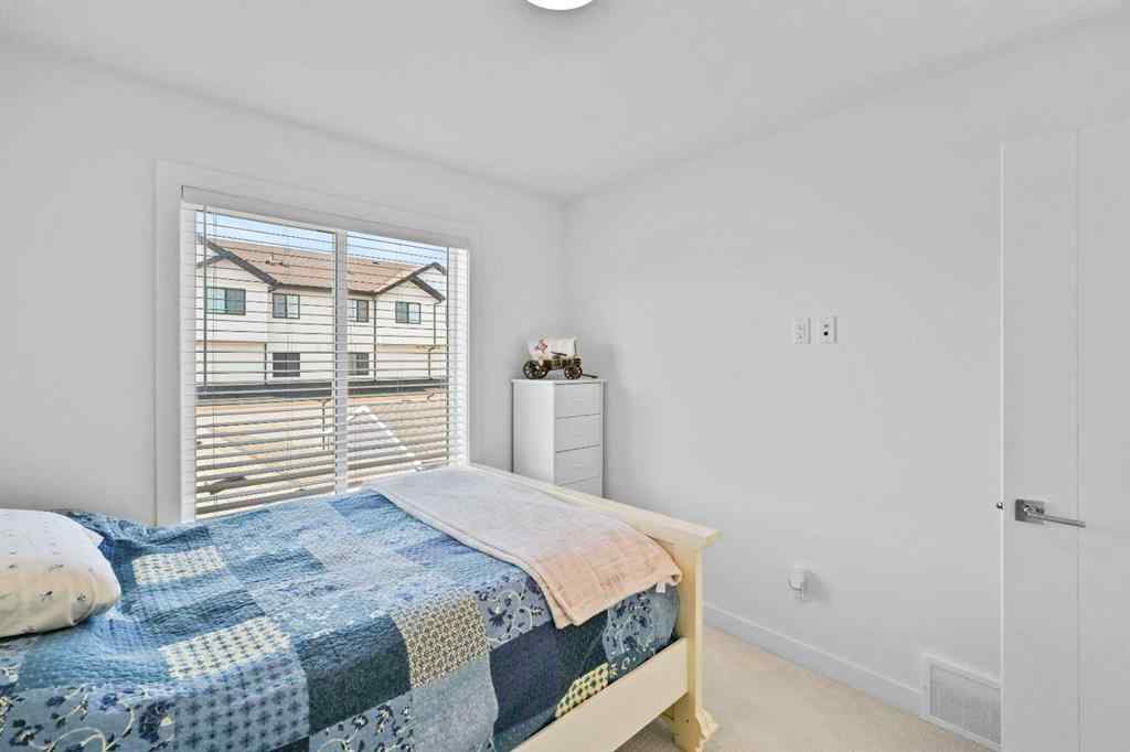 MLS® A2251493 - 60 Amblefield Terrace NW in Moraine Calgary, Residential